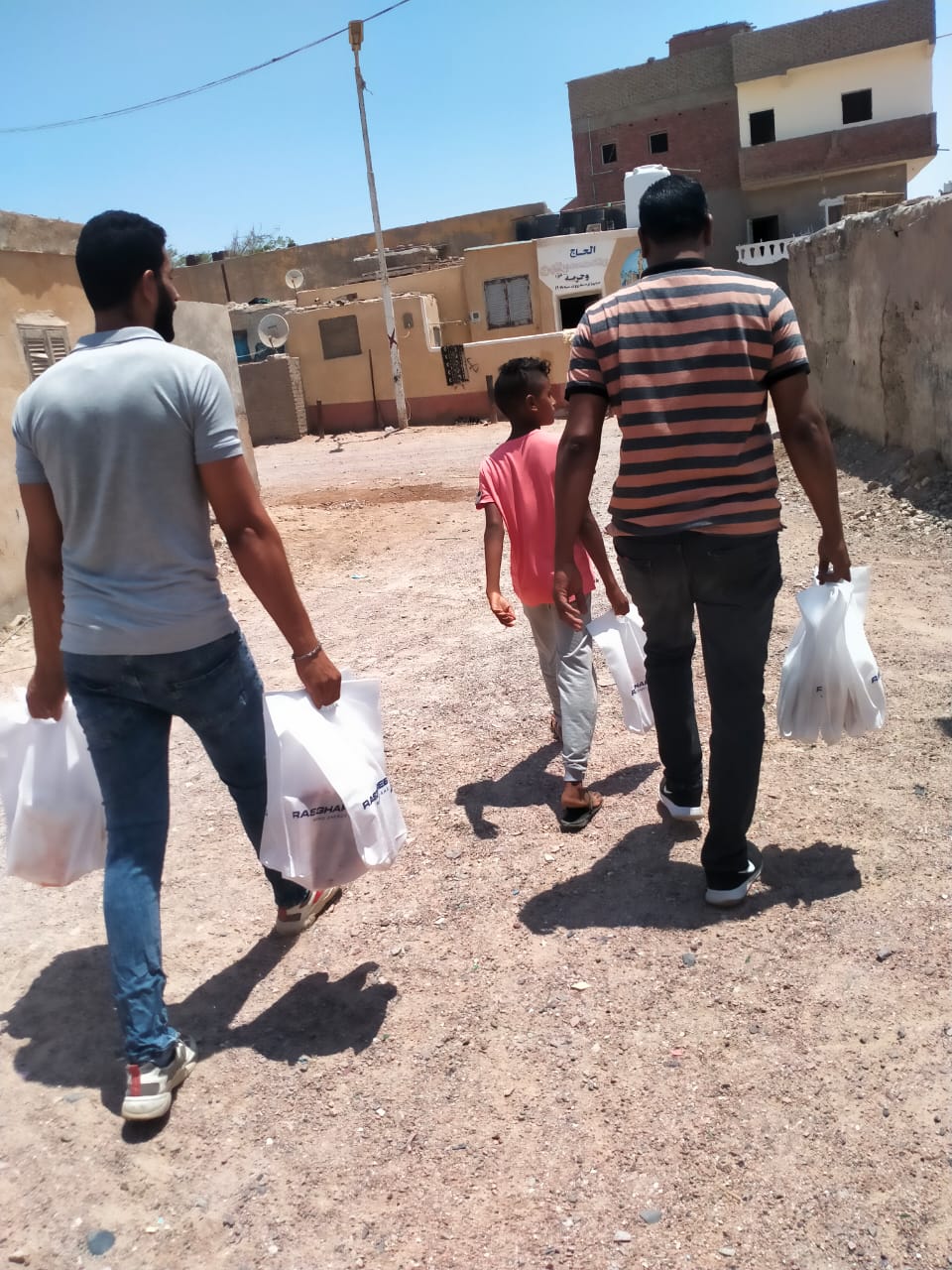 Eid charity boxes being delivered to families in Ras Ghareb.